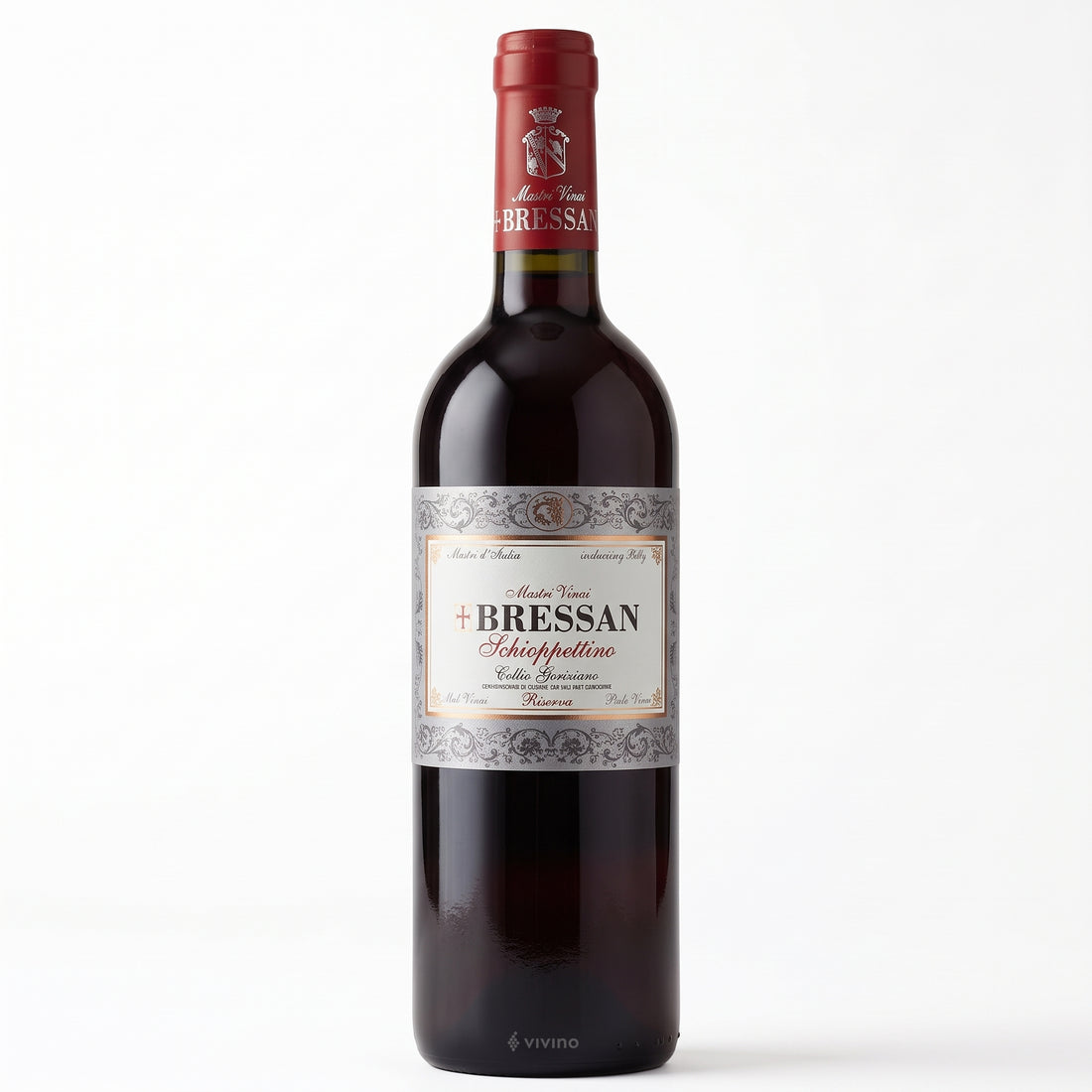 Bottiglia di vino rosso Schioppettino 2013 dei Mastri vinai Bressan in primo piano su sfondo bianco.